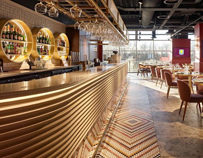 Modern bar with light streaming in through the windows